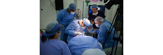 Dr. U performs hair transplant surgery with the Dr.UGraft System, featuring the Intelligent Punch (Dr.UPunch i™).